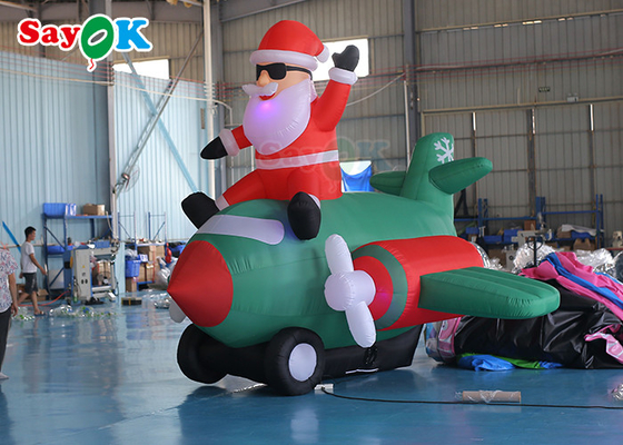 La Navidad inflable Santa Claus Flying Airplane Blowing del viejo hombre LED del paño de Oxford