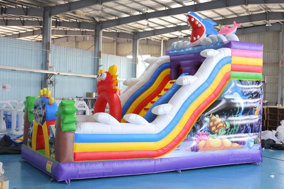 Deslizador seco inflable impreso a medida con diseño de castillo rebobinado para eventos infantiles