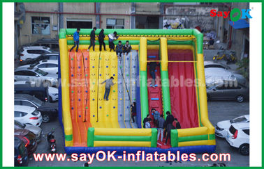 Deslizador inflables comerciales 9.5 * 7.5 * 6.5m colorido deslizador inflables de salpicador con pared de escalada para parque de diversiones
