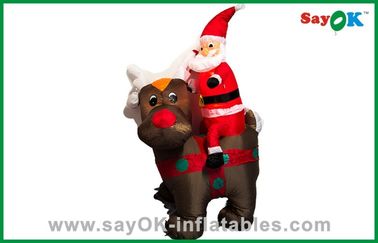 Decoración inflable de la Navidad de la Navidad del padre lindo de Papá Noel que monta un oso negro