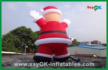La Navidad inflable roja de encargo Papá Noel con el personaje de dibujos animados inflable del pan