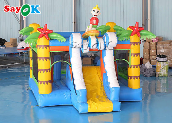Castillo de salto inflable de la palmera con la diapositiva tropical del muchacho de la resaca