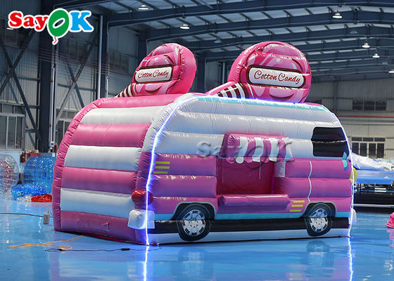 El coche rosado inflable de la tienda los 4.5x3x3.8m del trabajo forma la cabina inflable de la seda de la comida del caramelo de la tienda del aire para al aire libre