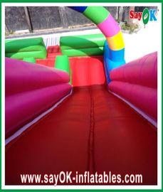 Deslizamiento y tobogán inflable con tema de payaso de la piscina tobogán inflable de salpicadero multicolor para parque de diversiones