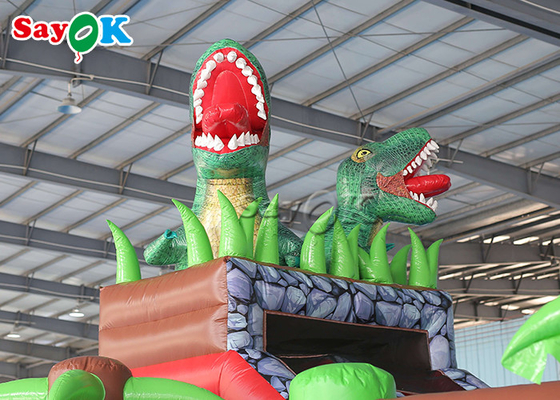 Castillo animoso de la despedida de los niños del parque de atracciones del tema inflable del dinosaurio